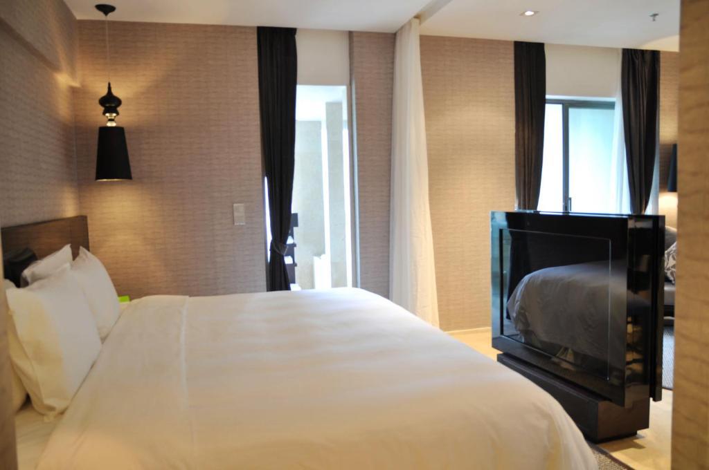 Le Parker Hotel Санья Номер фото